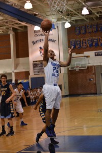 Jordan Venters ('14) makes  an easy field goal in the first half of play. Photo by Tue Duong