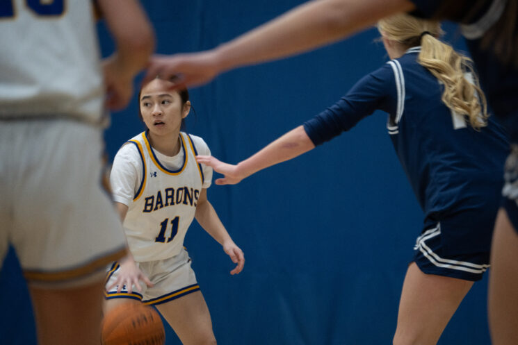 Kailyn Huynh looks for an opening in the defense.